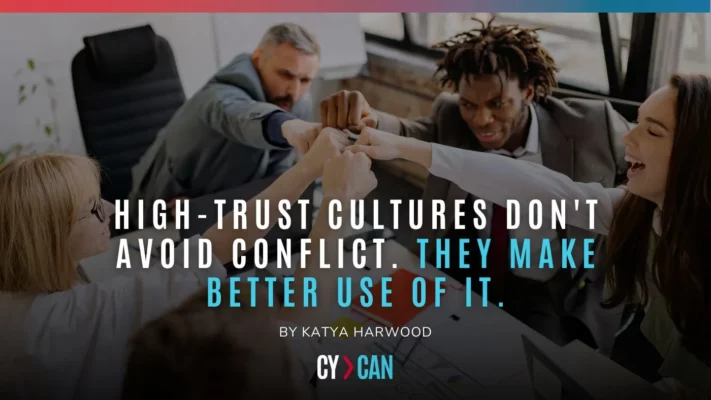 Leadership team demonstrating trust and collaboration through constructive conflict