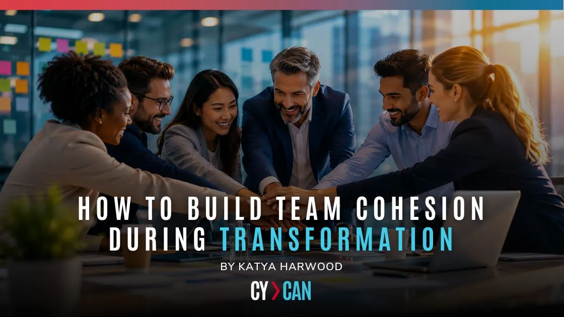 Executive team joining hands during a collaborative meeting