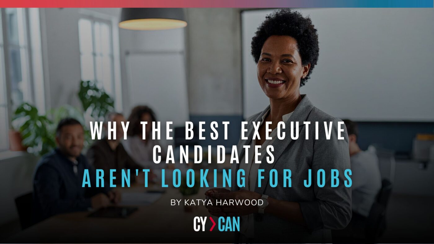 Executive leader in a meeting smiling towards camera